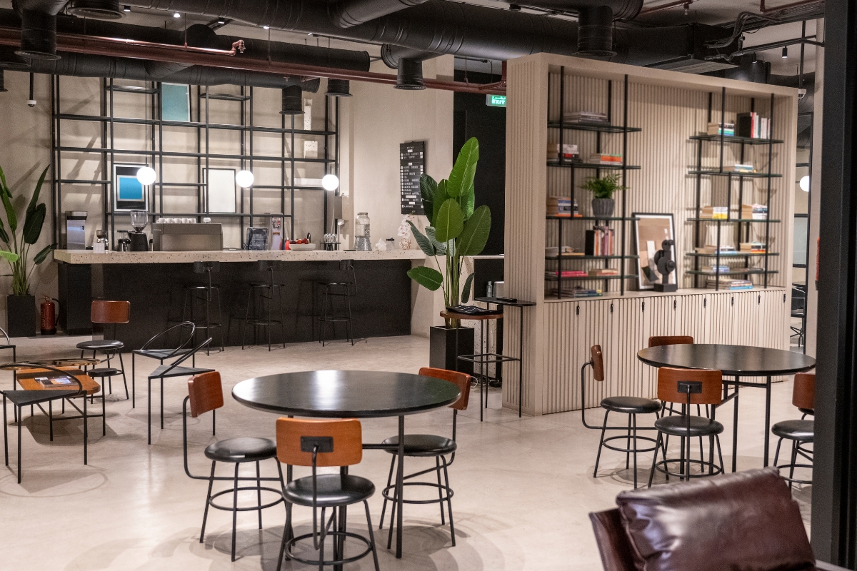 Modern Tables & Chairs in an airy Tenant Dining Space