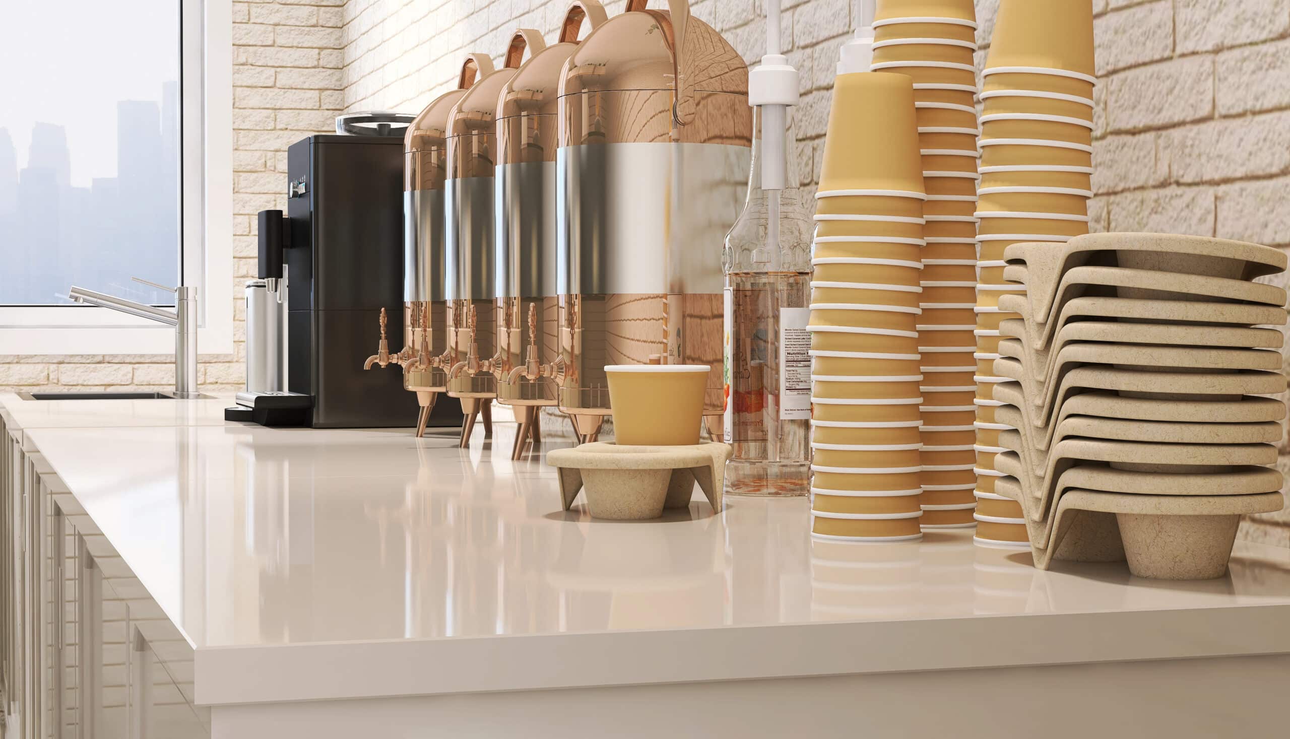 Stacks of paper cups next to a beverage station
